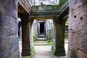 Pillar: Arched walkways and pillars in the ruins of Bayon Temple, Angkor Thom, Siem Reap