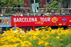 Tourism: Barcelona city tour open top tourist bus in Barcelona, Spain
