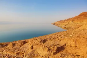 Amman And Jordan: Barren shoreline and salt water of the Dead Sea, Jordan
