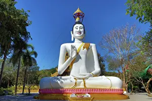 Statues: Big white Buddha statue at Wat Ko Kaew Pitsadan Temple, Koh Samet, Thailand