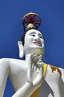 Statues: Big white Buddha statue at Wat Ko Kaew Pitsadan Temple, Koh Samet, Thailand