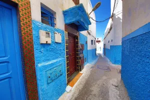 Blue and white walls of buildings in the Kasbah of the Udayas in Rabat, Morocco