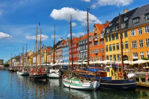 Building: Boats and coloured houses at Nyhavn Quay in Copenhagen, Denmark