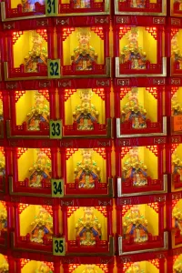 Religious: Boxes of religious figures at the Thean Hou Chinese Temple, Kuala Lumpur, Malaysia
