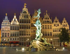 Statues: The Brabo Fountain in the Grote Markt at night in Antwerp, Belgium