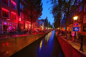 Amsterdam: Brothels in the red light district on the Oudezijds Achterburgwal canal in Amsterdam