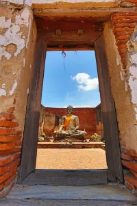 Wonders Of Thailand: Buddha Statue framed in window frame, Wat Lokayasutharam, Ayutthaya, Thailand
