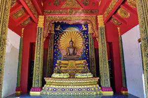 Statues: Buddha statue and shrine at Wat Ko Kaew Pitsadan Temple, Koh Samet, Thailand