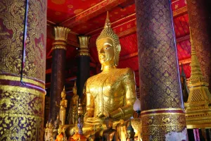 Luang Prabang, Laos: Buddha statue in Wat Mai Suwannaphumaham (aka Vat May) Temple, Luang Prabang, Laos