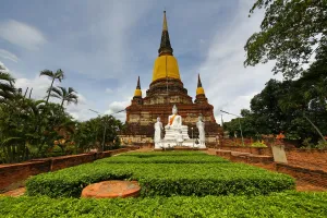 Statues: Buddha statues and chedi at Wat Yai Chaimongkol Temple, Ayutthaya, Thailand