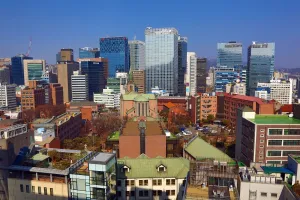 Blocks: Buildings of the Myeongdong skyline and Myeongdong Cathedral, Seoul, Korea