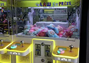 Prints of Claw Express claw machine arcade game with Labubu doll prizes, Hong Kong, China Hong Kong Images: Claw Express claw machine arcade game with prizes, Hong Kong, China