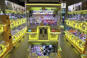 Prints of Claw Express claw machine arcade game with prizes, Hong Kong, China Hong Kong Images: Claw Express claw machine arcade game with prizes, Hong Kong, China