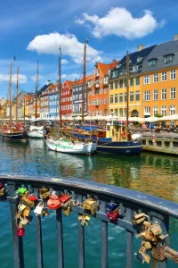 Coloured houses and boats at Nyhavn Quay in Copenhagen, Denmark