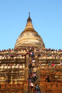 Tourism: Crowds of tourists on Shwesandaw Pagoda to watch the sunset in Bagan, Myanmar (Burma)