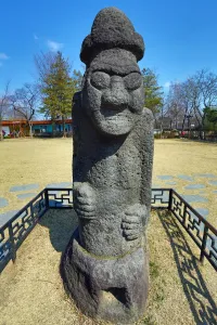 Seoul, Korea: Dolhareubang Statue at National Folk Museum at Gyeongbokgung Palace in Seoul, Korea