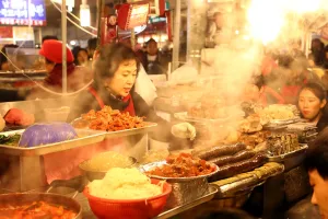 Stalls: Food stalls at night at Gwangjang Market in Jongro, Seoul, Korea
