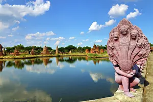 Ancient: The Garden of Sacred Stupa and a Naga Statue at Muang Boran