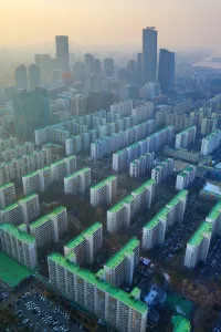 Building: General view of blocks of flats and the Seoul city skyline at dusk in Seoul, Korea