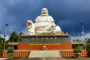 Vietnam: Giant Buddha statue at Vinh Trang Temple, near My Tho, Mekong Delta, Vietnam