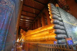 Golden: Giant reclining gold Buddha statue at Wat Pho temple, Bangkok, Thailand