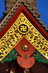 Symbols: Gold Buddhist cross symbol on a giant vase at the Sensoji Asakusa Kannon Temple