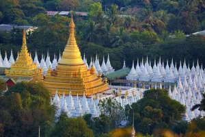 Mandalay, Myanmar: Gold stupa and white dhamma ceti shrines of Sandamuni Pagoda, Mandalay, Myanmar (Burma)