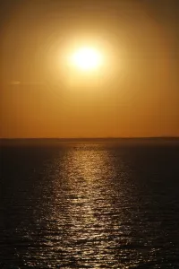 Sunsets: Golden sunset over the sea at dusk