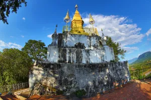Luang Prabang, Laos: Golden Wat That Chomsi temple Stupa on Mount Phousi in Luang Prabang, Laos