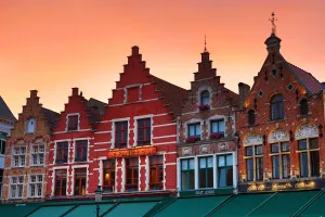 Guild houses converted into restaurants in the Market Square or Markt, Bruges, Belgium