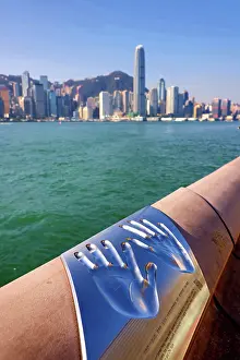 Prints of Handprints walk on the Avenue of the Stars with the Hong Kong skyline, Tsim Sha Tsui Promenade, Kowloon, Hong Kong, China Hong Kong Images: Handprints walk on the Avenue of the Stars with the Hong Kong skyline