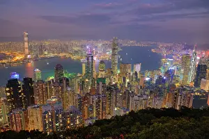 Prints of Hong Kong City Skyline and Victoria Harbour at sunset, Hong Kong, China Hong Kong Images: Hong Kong City Skyline and Victoria Harbour at sunset, Hong Kong, China