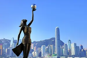 Prints of The Hong Kong Film Awards Statue, of a Goddess holding a Pearl, in front of Victoria Harbour, Hong Kong, China. The statue embodies the artistic and cultural endeavour of the Hong Kong film industry Hong Kong Images: The Hong Kong Film Awards Statue
