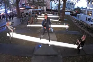 Impulse, a sea of singing seesaws installation, Leicester Square, London