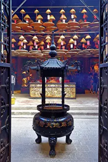 Prints of Incense spirals burning in Tin Hau Temple in Yau Ma Tei, Hong Kong, China Hong Kong Images: Incense spirals burning in Tin Hau Temple in Yau Ma Tei, Hong Kong, China