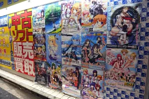 Advert: Japanese manga and anime advertising posters in Akihabara Electric Town in Tokyo, Japan