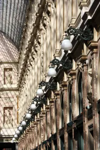 Architecture: Lamps and columns of the Galerie de la Reine shopping gallery, Brussels, Belgium