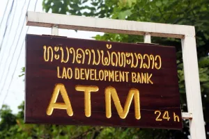 Luang Prabang, Laos: Lao Development Bank ATM cashpoint sign in Luang Prabang, Laos
