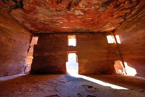 Heritage: Light streaming through the windows of the Urn Tomb of the Royal Tombs in the rock city of Petra