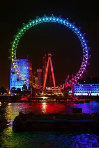 London Eye illuminated in Rainbow colours to promote the film Trolls in London