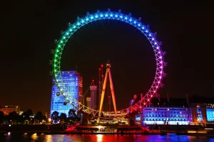 Movie: London Eye illuminated in Rainbow colours to promote the film Trolls in London
