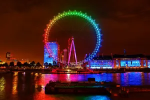 London Eye illuminated in Rainbow colours to promote the film Trolls in London