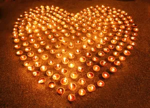 Illuminated: Love heart shape made out of candles and light