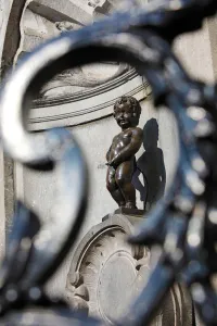 Statues: Manneken Pis, statue of a boy peeing into a fountain, Brussels, Belgium