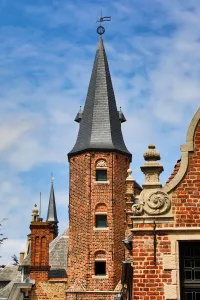 Medievel tower and roof decorations on the Huidevettershuis, Bruges, Belgium