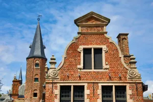 Architecture: Medievel tower and roof decorations on the Huidevettershuis, Bruges, Belgium