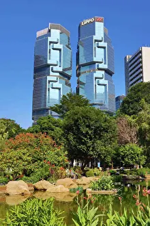 Hong Kong: Modern architecture of the Lippo Centre glass skyscraper and Hong Kong Park in Hong Kong