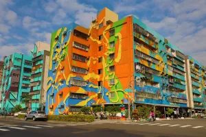 Center: Murals on buildings in Weiwu Mimi Village, Kaohsiung City, Taiwan