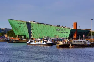 Center: NEMO Science Centre on the waterfront in Amsterdam, Holland