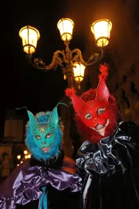 Venice Carnival: People wearing cat masks and costumes at the Venice Carnival